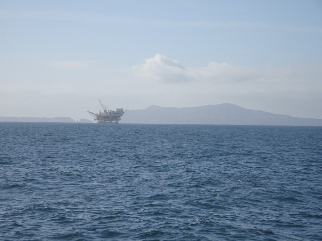 Crossing to Santa Cruz Island: oil platform and Anacapa Island